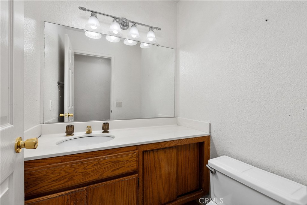 Downstairs powder room. - 30 San Bonifacio, Rancho Santa Margarita CA 92688 - photo 19