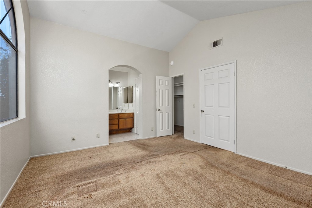 Large master bedroom looking towards master bath. - 30 San Bonifacio, Rancho Santa Margarita CA 92688 - photo 21