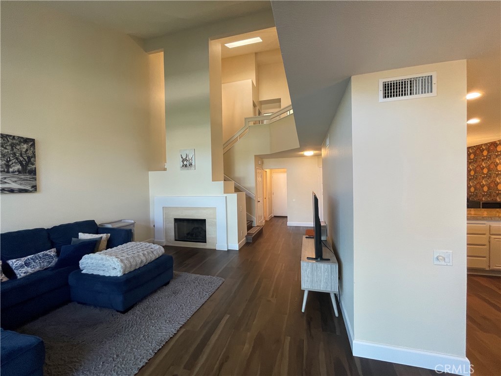 Family Room with a Fireplace - 31 Calle Melinda, Rancho Santa Margarita CA 92688 - photo 10