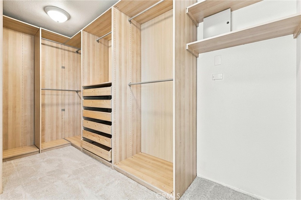 Primary suite features a walk in closet with built ins - 32922 Brookseed, Rancho Santa Margarita CA 92679 - photo 38