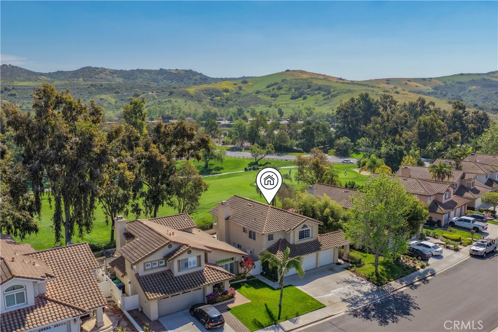 Backs up to the 8th fairway on the golf course - 34 Reata, Rancho Santa Margarita CA 92688 - photo 1