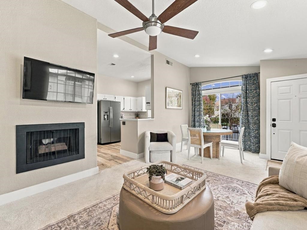 Living area with cozy fireplace. - 39 De Lino, Rancho Santa Margarita CA 92688 - photo 3