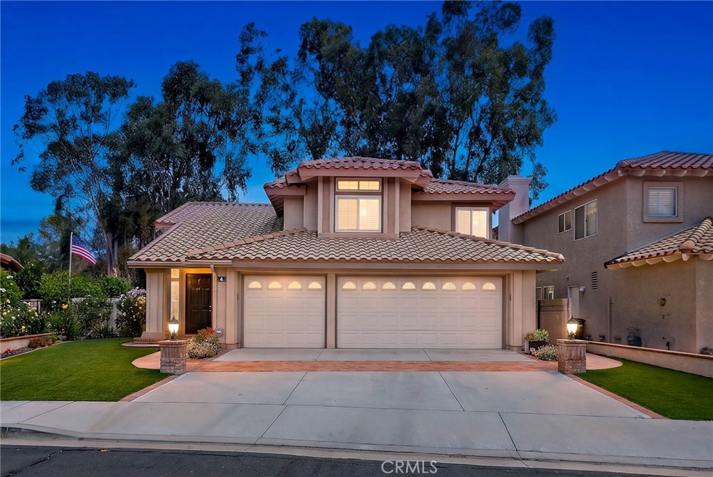 Upgraded five-bedroom home featuring a highly desirable main-floor bedroom! (Photo has been digitally edited to depict t - 4 Reata, Rancho Santa Margarita CA 92688 - photo 1