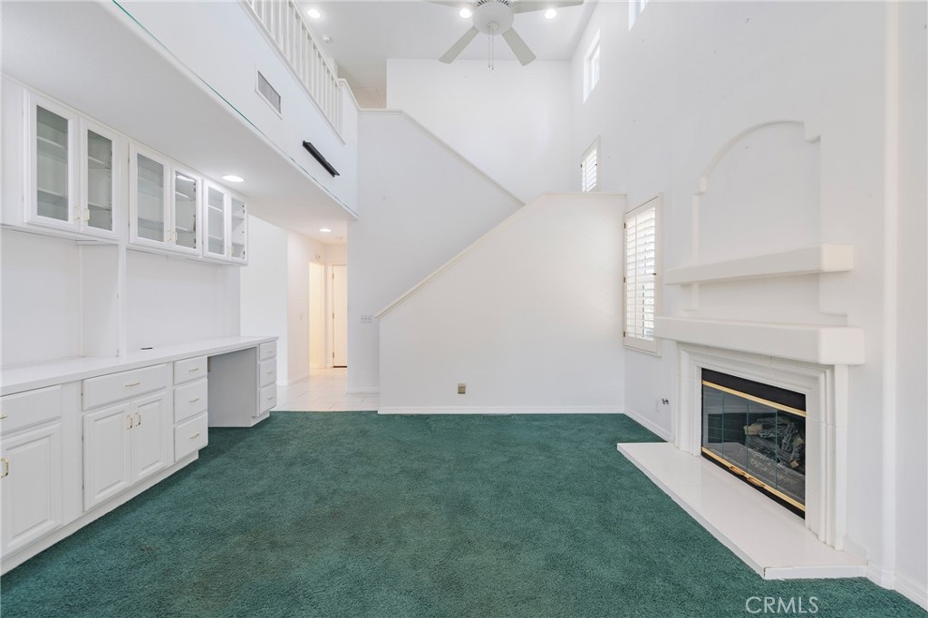 Family room with cozy Fireplace - 42 Via Brida, Rancho Santa Margarita CA 92688 - photo 10