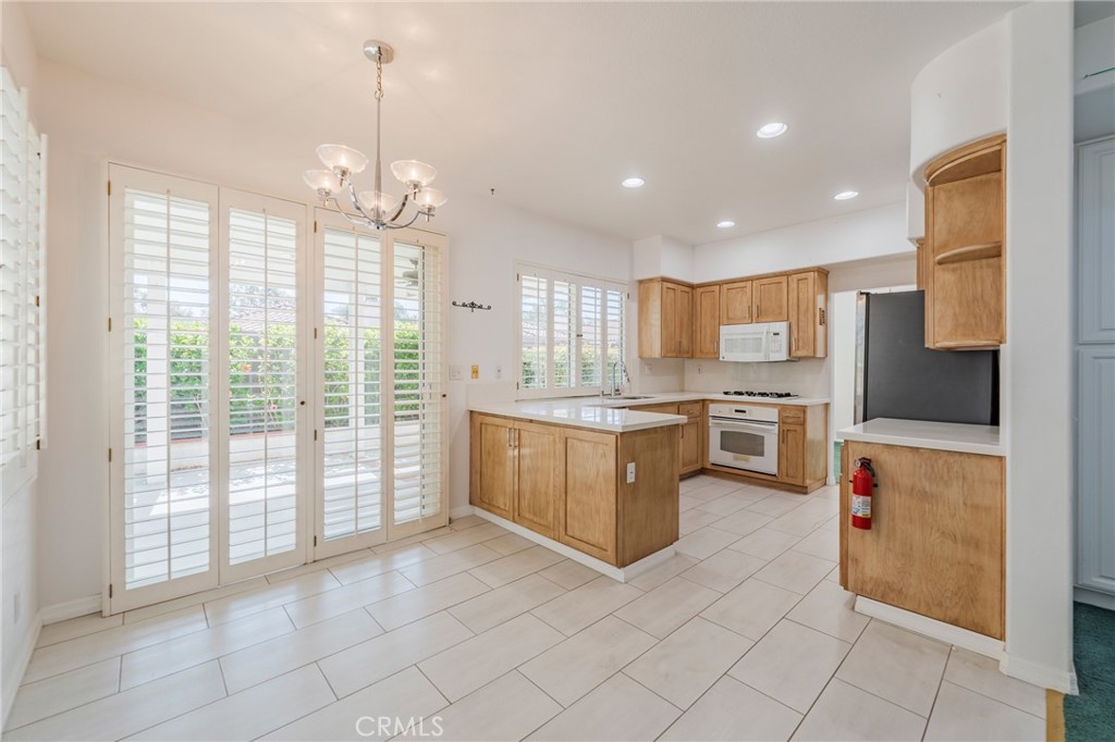 Kitchen has area for kitchen table - 42 Via Brida, Rancho Santa Margarita CA 92688 - photo 13