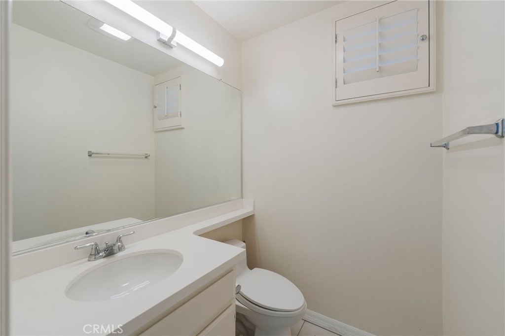 Downstairs Powder room with stone counters - 42 Via Brida, Rancho Santa Margarita CA 92688 - photo 18