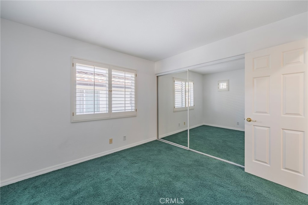 3rd bedroom with mirrored closet doors - 42 Via Brida, Rancho Santa Margarita CA 92688 - photo 29