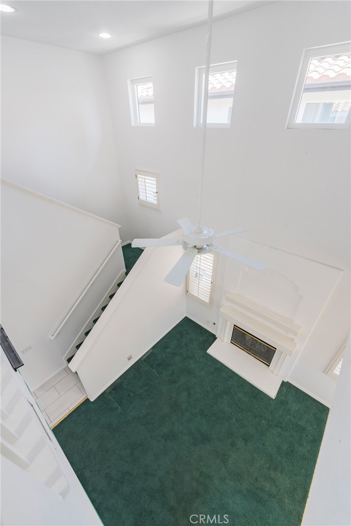 Looking down into family room from upstairs landing - 42 Via Brida, Rancho Santa Margarita CA 92688 - photo 32