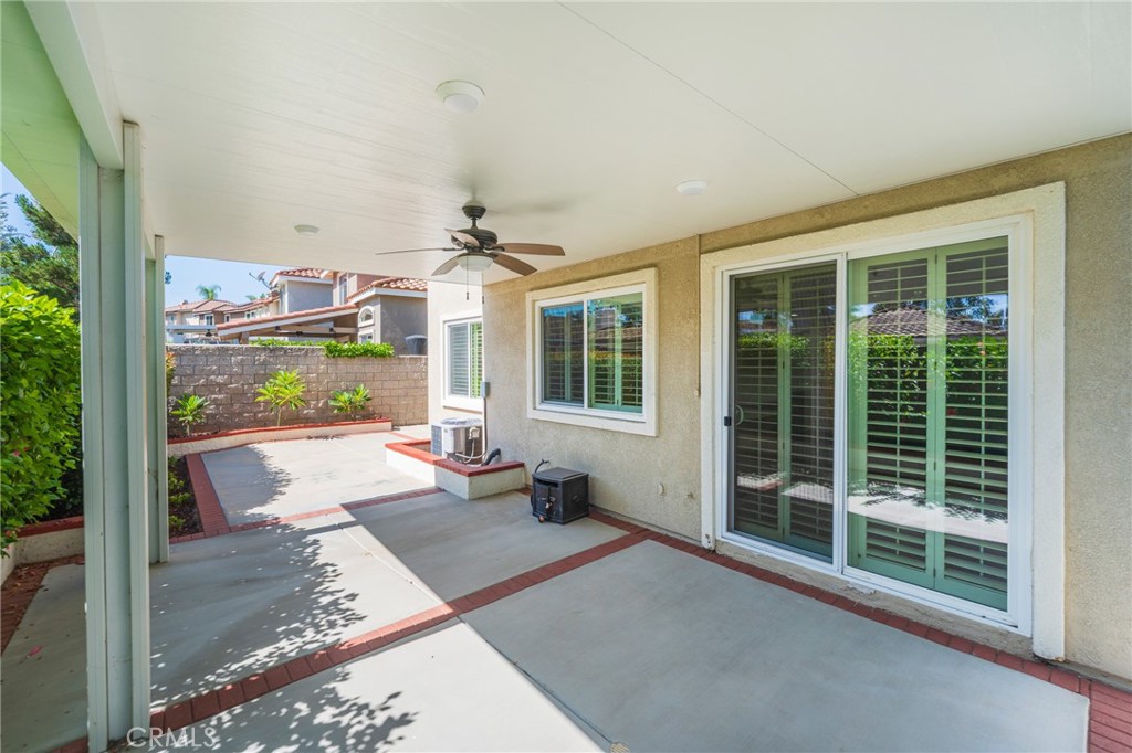 Covered patio with ceiliing fan - 42 Via Brida, Rancho Santa Margarita CA 92688 - photo 35