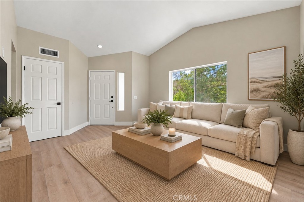 Virtually staged living room - 67 Rabano, Rancho Santa Margarita CA 92688 - photo 4