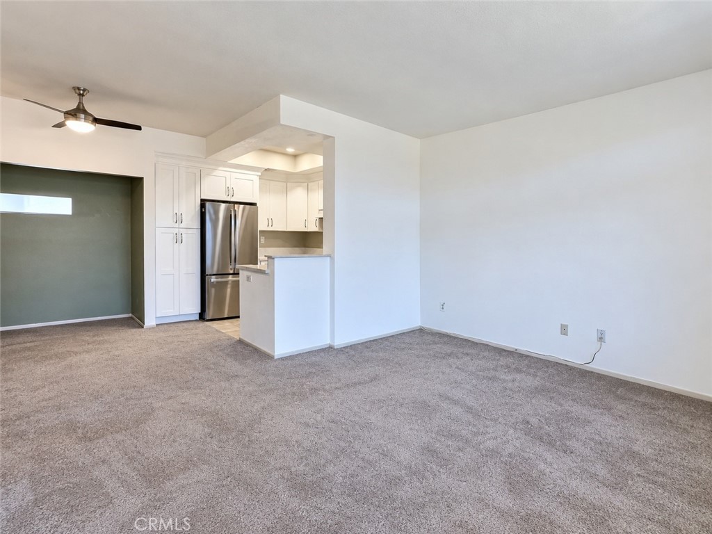 Open concept living room, dining area and kitchen - 9 De Lino, Rancho Santa Margarita CA 92688 - photo 9