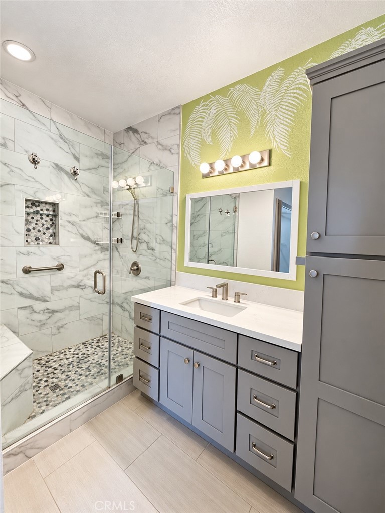 Updated bathroom cabinetry and shower - 9 De Lino, Rancho Santa Margarita CA 92688 - photo 21