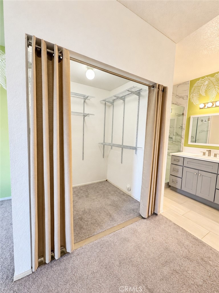 Walk in closet - 9 De Lino, Rancho Santa Margarita CA 92688 - photo 28