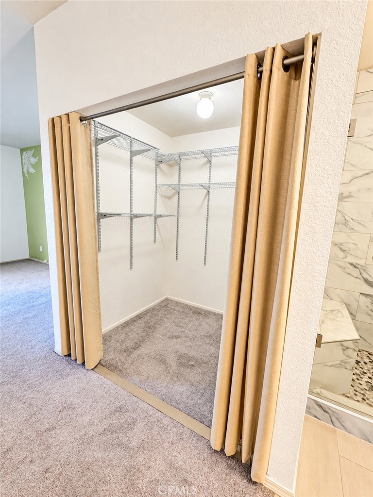 Large walk in closet - 9 De Lino, Rancho Santa Margarita CA 92688 - photo 29