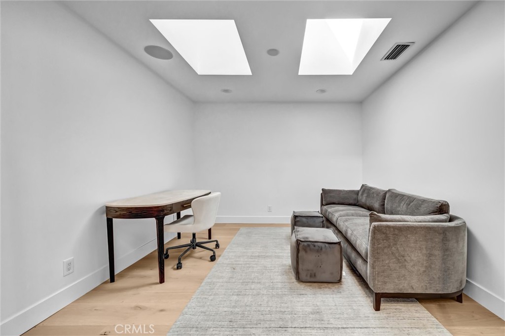 office area from entry with two skylights - 11444 Harrisburg Road, Rossmoor CA 90720 - photo 16