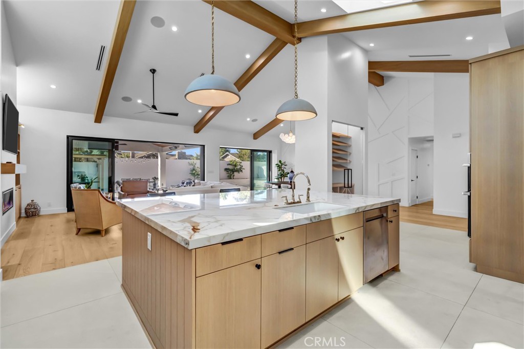 kitchen looking into living room and outdoor kitchen - 11444 Harrisburg Road, Rossmoor CA 90720 - photo 23