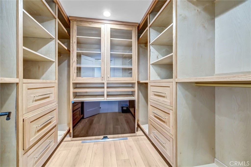 Primary walk in closet - 11444 Harrisburg Road, Rossmoor CA 90720 - photo 27