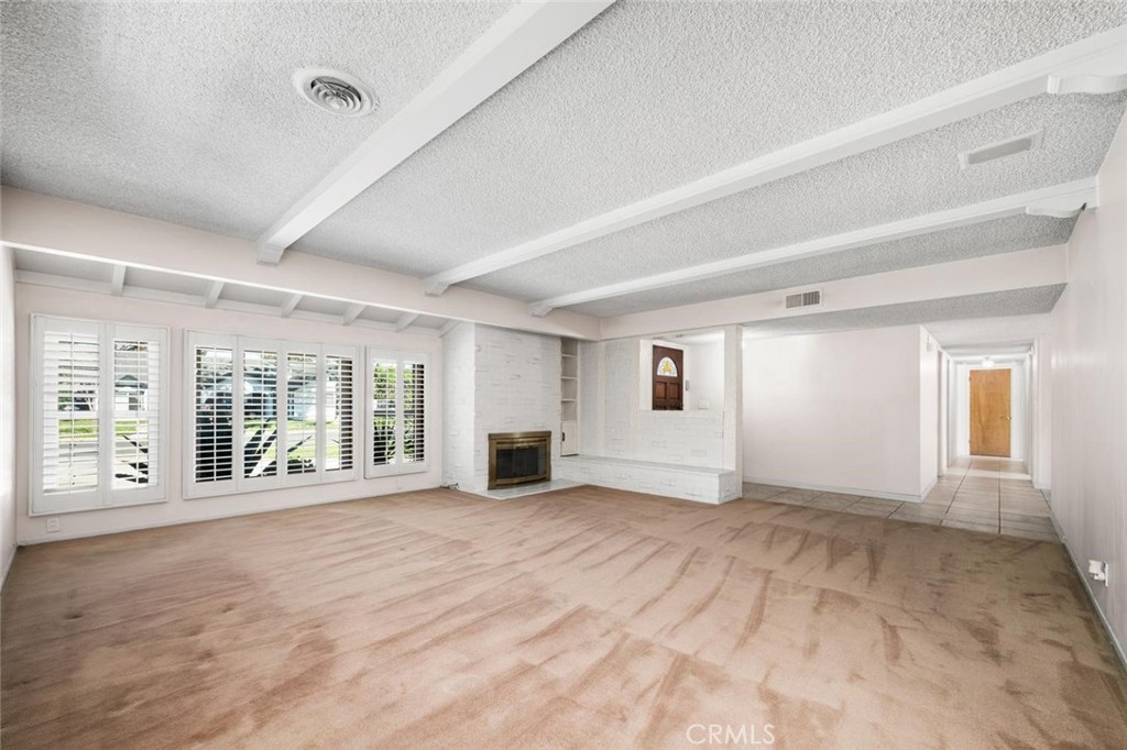 Large living room w/ fireplace - 3082 Brimhall Drive, Rossmoor CA 90720 - photo 7