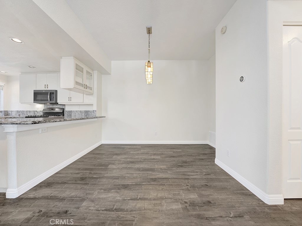 The dining room is adjacent to the kitchen. - 1031 Via Presa, San Clemente CA 92672 - photo 8