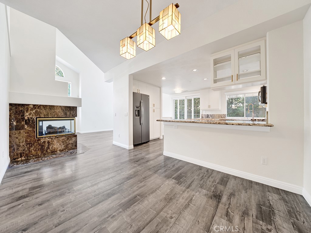 Another view of the dining room, kitchen and living room. - 1031 Via Presa, San Clemente CA 92672 - photo 12