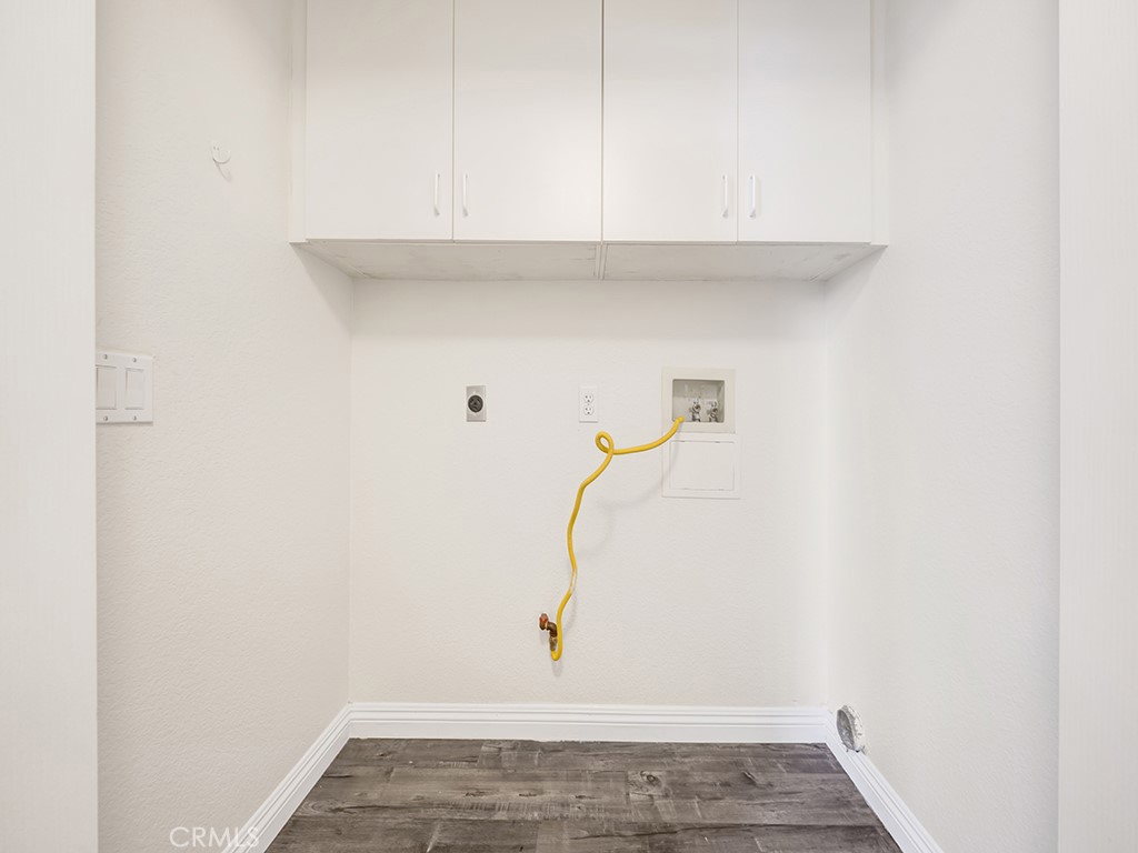 Downstairs is a laundry closet. - 1031 Via Presa, San Clemente CA 92672 - photo 25