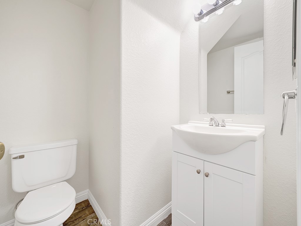 Downstairs is a half bathroom for guests. - 1031 Via Presa, San Clemente CA 92672 - photo 26