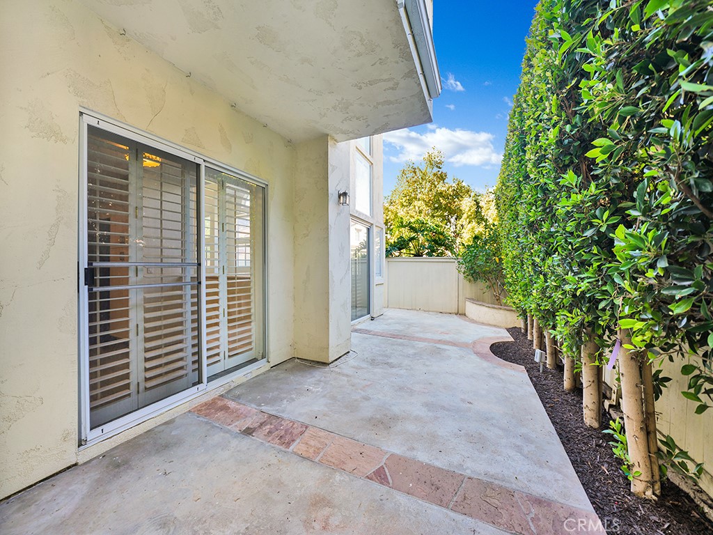 The backyard has a lemon tree and tall trees providing both privacy and shade. - 1031 Via Presa, San Clemente CA 92672 - photo 29