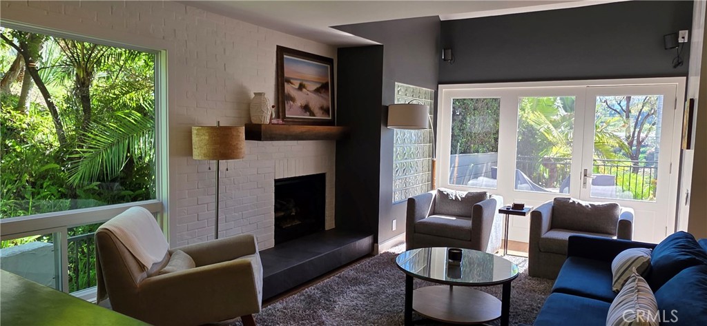 Living Room accesses it's own Terrace w/ beautiful views of golf course, hills - 106 Avenida Mesita, San Clemente CA 92673 - photo 5