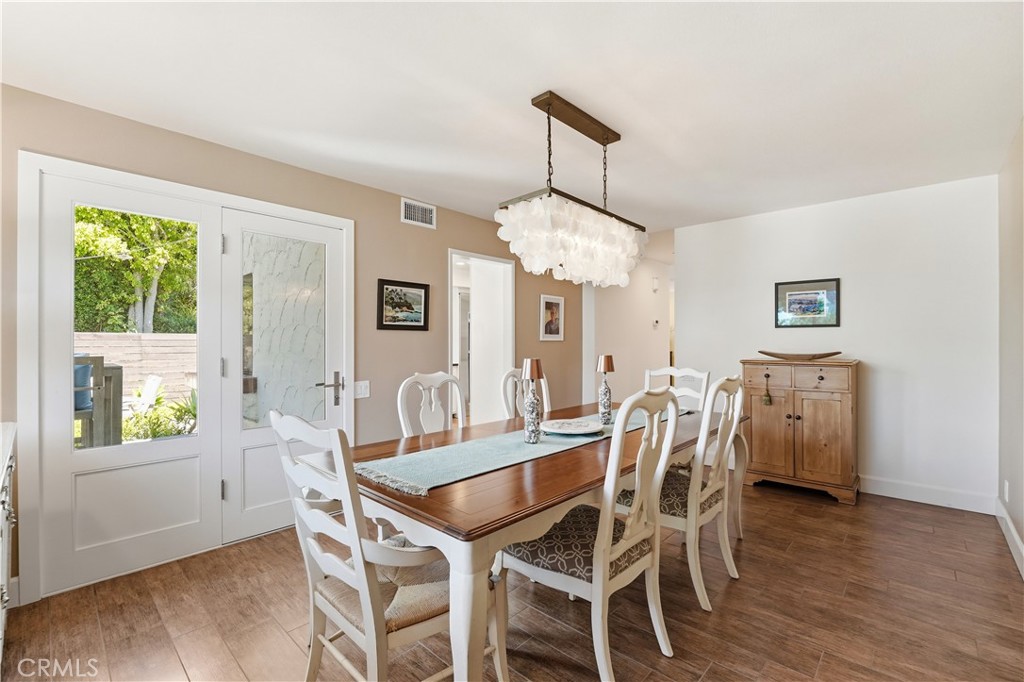 Xtra large formal dining room accesses thru new french doors to serene back yard - 106 Avenida Mesita, San Clemente CA 92673 - photo 14