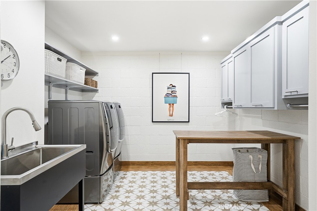 Oversized downstairs laundry room remodeled to maximize function & Storage - 106 Avenida Mesita, San Clemente CA 92673 - photo 32