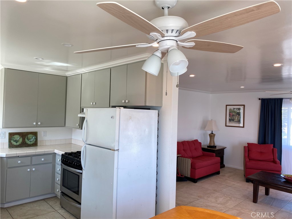 Kitchen opens to dining and family room. - 1107 Buena Vista, San Clemente CA 92672 - photo 7