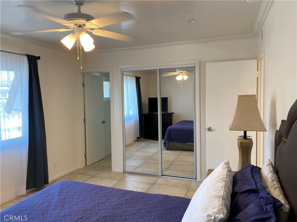 Primary bedroom with entrance to private bathroom. - 1107 Buena Vista, San Clemente CA 92672 - photo 16