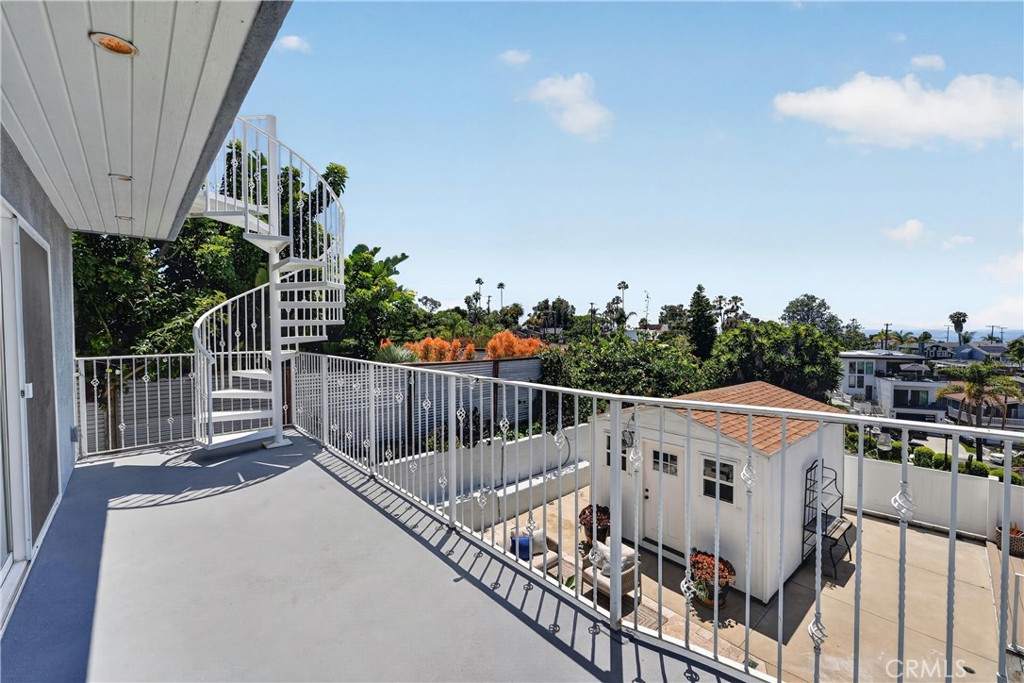 Main floor deck with spiral staircase leading to the 3rd floor - 111 Revuelta Court, San Clemente CA 92672 - photo 9