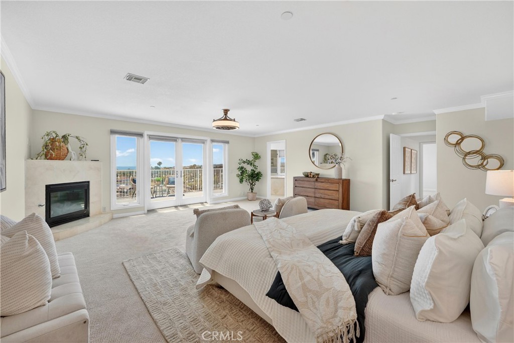 Primary suite with fireplace and ocean views - 111 Revuelta Court, San Clemente CA 92672 - photo 39