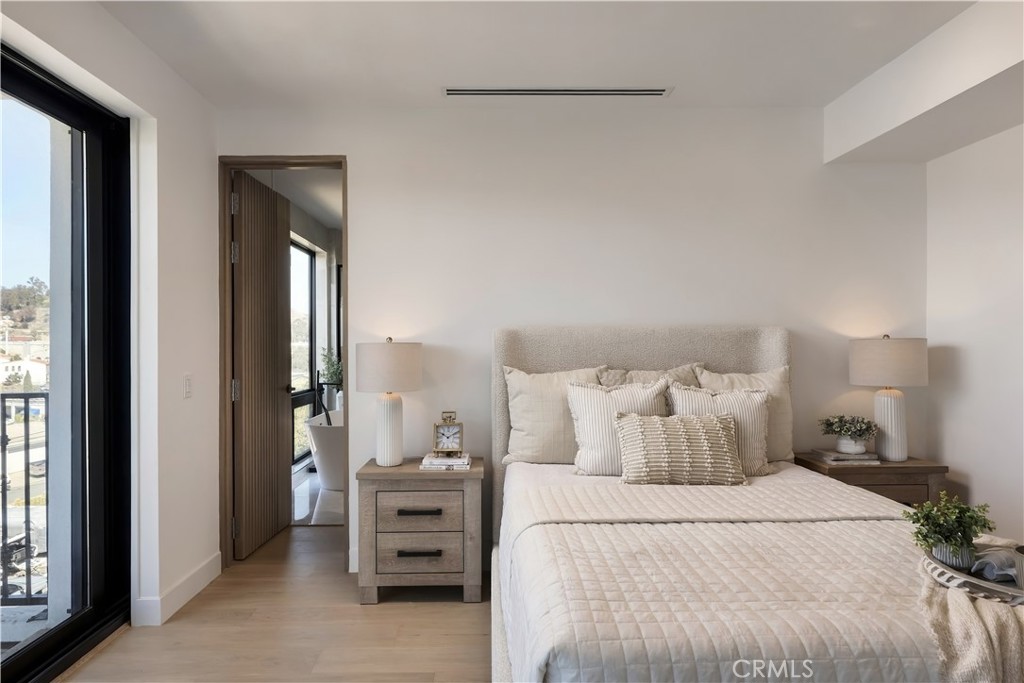 Primary:A fluted wood door opens to a spa-inspired bath. - 126 Calle Redondel, San Clemente CA 92672 - photo 36