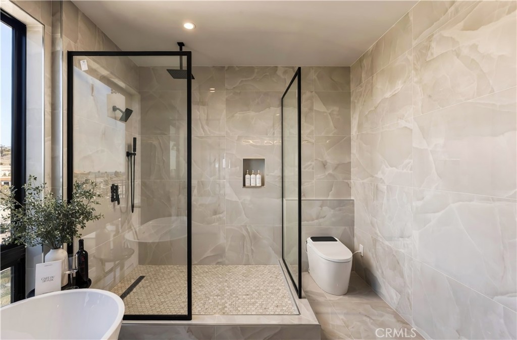 Primary: Double vanity: Warm wood cabinetry against onyx-look stone, with sculptural lighting. - 126 Calle Redondel, San Clemente CA 92672 - photo 43