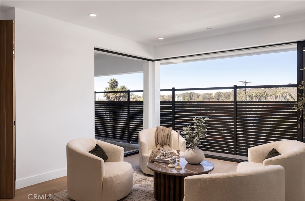 Corner glass disappears, opening the den to the covered terrace. - 126 Calle Redondel, San Clemente CA 92672 - photo 51