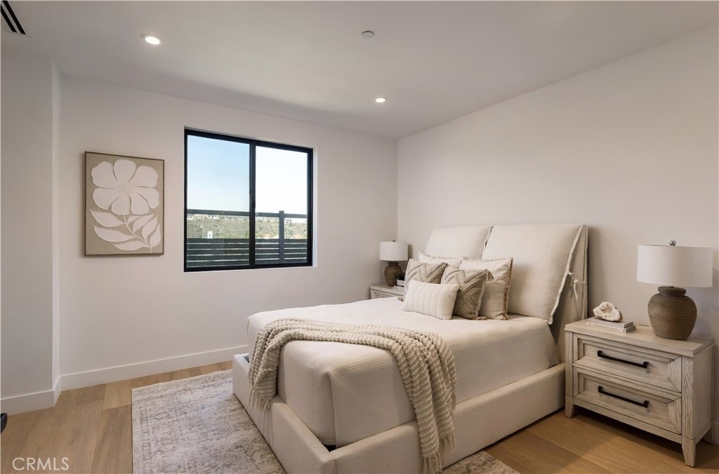 A serene suite with hillside views and a fluted wood entry door and walk in closet - 126 Calle Redondel, San Clemente CA 92672 - photo 59