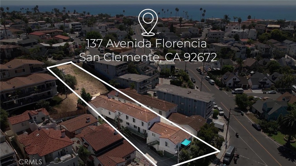 Arial view of property showing vacant land behind building, leading to Del Reposo. - 137 W Avenida Florencia, San Clemente CA 92672 - photo 1
