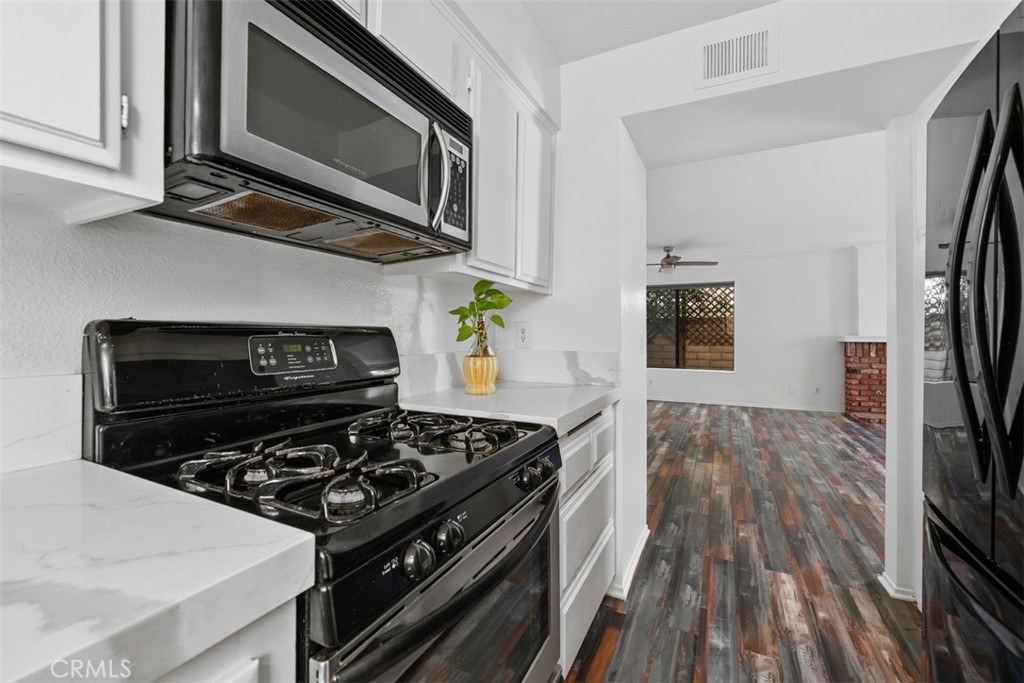 Kitchen Open to Living Room - 1404 Buena Vista 1, San Clemente CA 92672 - photo 8
