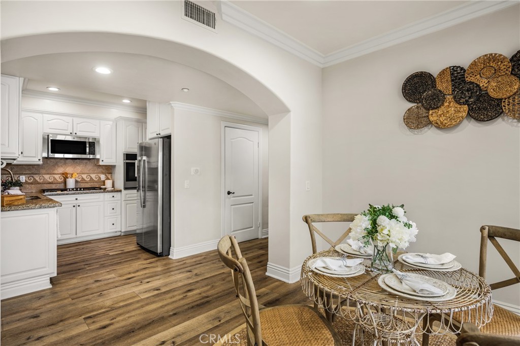 Dining area opens to the kitchen - 1520 N El Camino Real 10, San Clemente CA 92672 - photo 11
