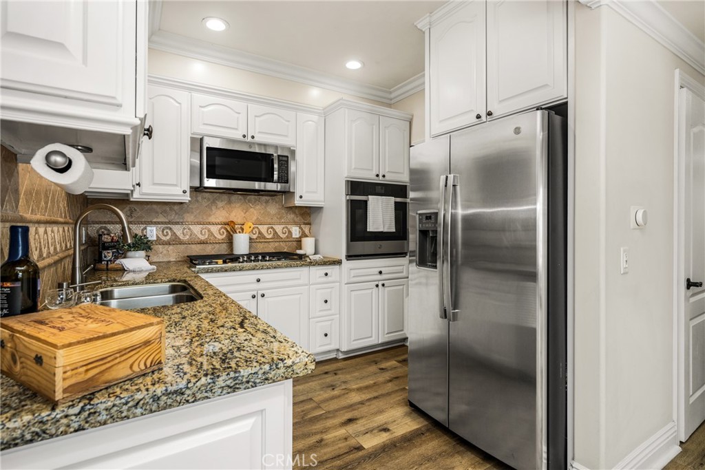 Stainless steel appliances and refrigerator is included - 1520 N El Camino Real 10, San Clemente CA 92672 - photo 13