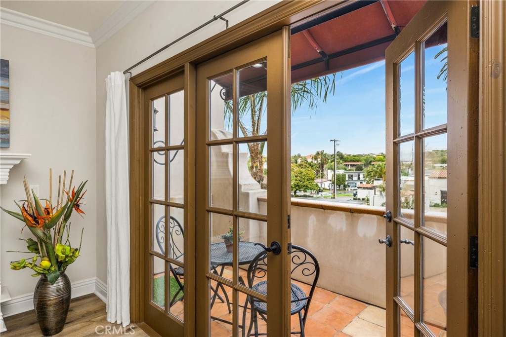 French doors to your private front patio - 1520 N El Camino Real 10, San Clemente CA 92672 - photo 16