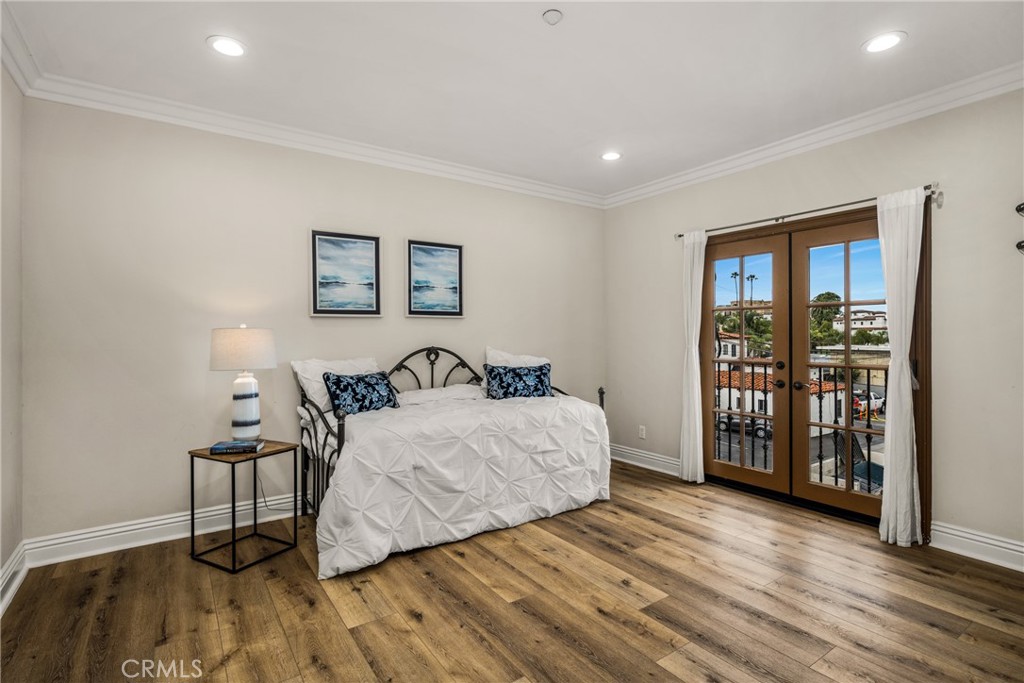 Rear Primary suite with west-facing balcony - 1520 N El Camino Real 10, San Clemente CA 92672 - photo 18