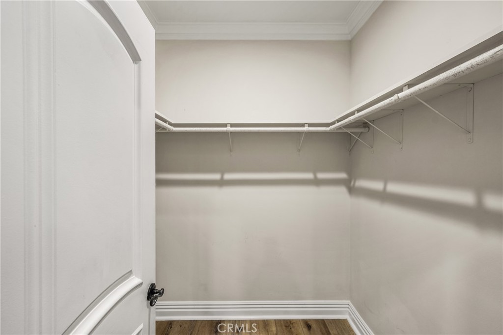 Primary bedroom walk-in closet - 1520 N El Camino Real 10, San Clemente CA 92672 - photo 23