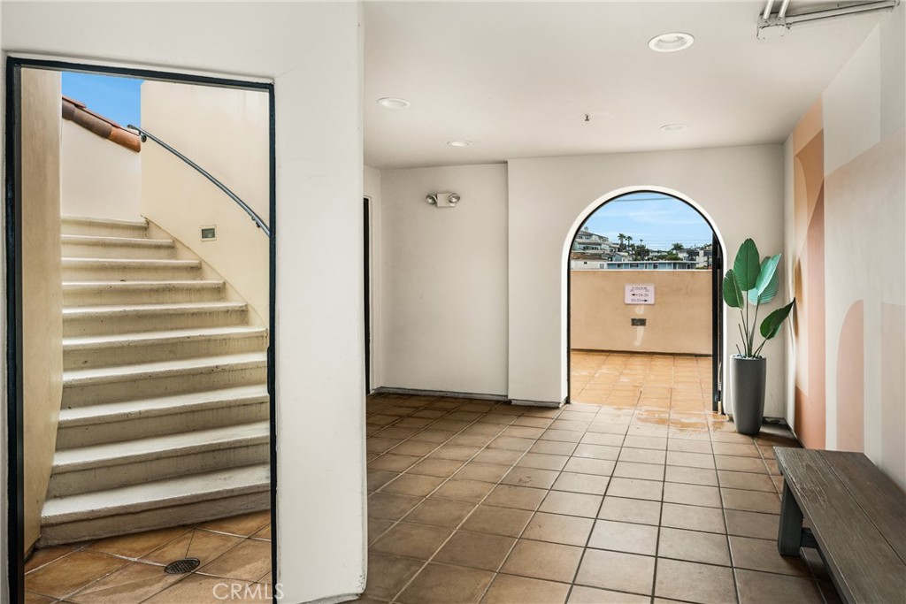 Stairway to the rooftop sun deck - 1520 N El Camino Real 10, San Clemente CA 92672 - photo 32