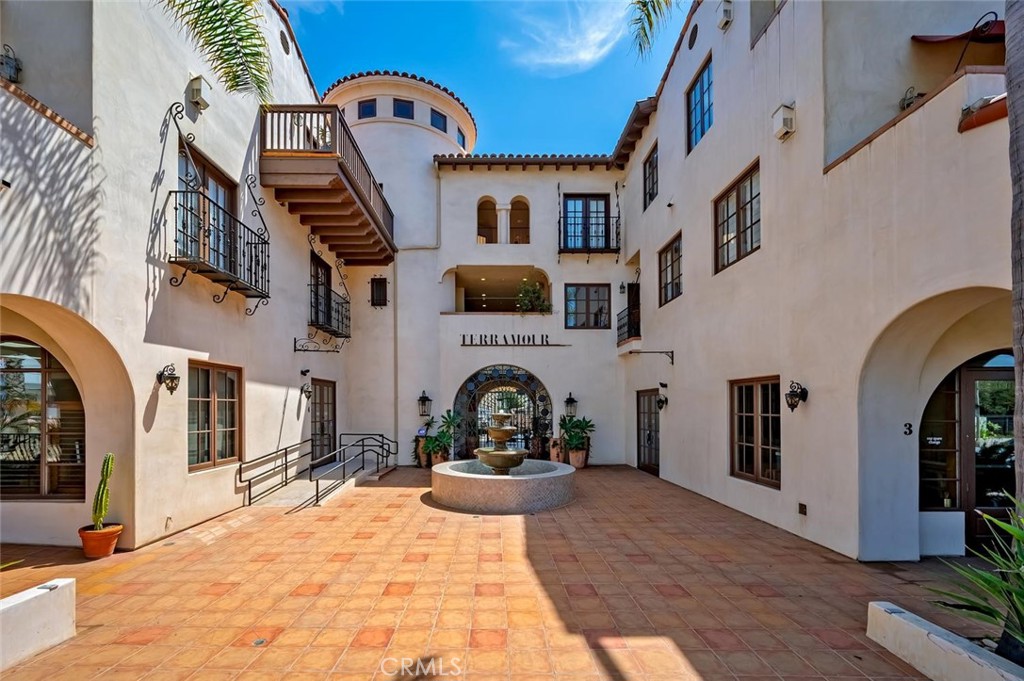 Tranquil water fountain at front entry. - 1520 N El Camino Real 26, San Clemente CA 92672 - photo 5