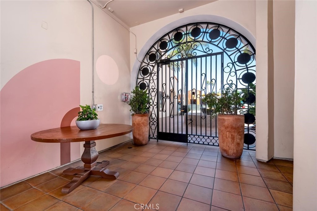 Secure front entry accessible via gate on with keypad - 1520 N El Camino Real 26, San Clemente CA 92672 - photo 6