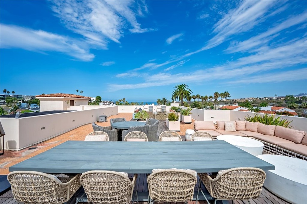 Ocean view Rooftop deck with BBQ area, fire pit and lots of cozy seating....great for entertaining! - 1520 N El Camino Real 26, San Clemente CA 92672 - photo 34