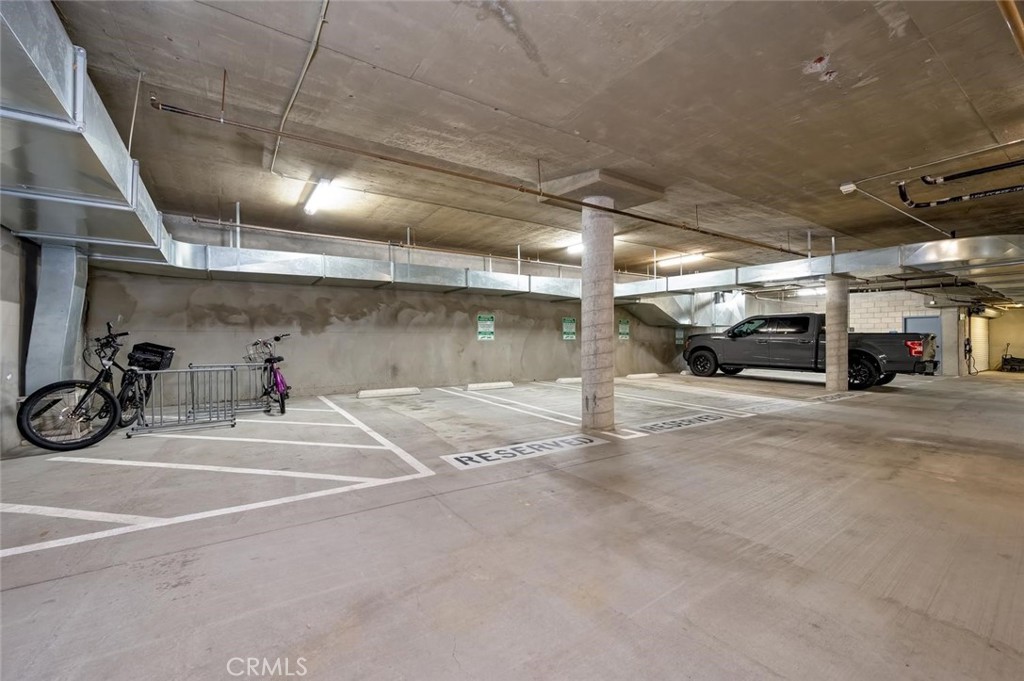 Other reserved parking space for unit 26 is adjacent to the bicycle rack. - 1520 N El Camino Real 26, San Clemente CA 92672 - photo 41